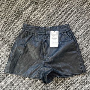 Black leather shorts